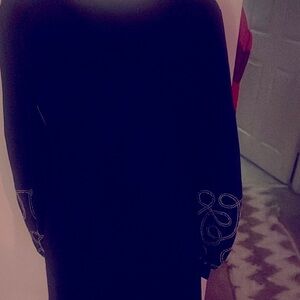 Chic Black Dress with Embellished Sleeves